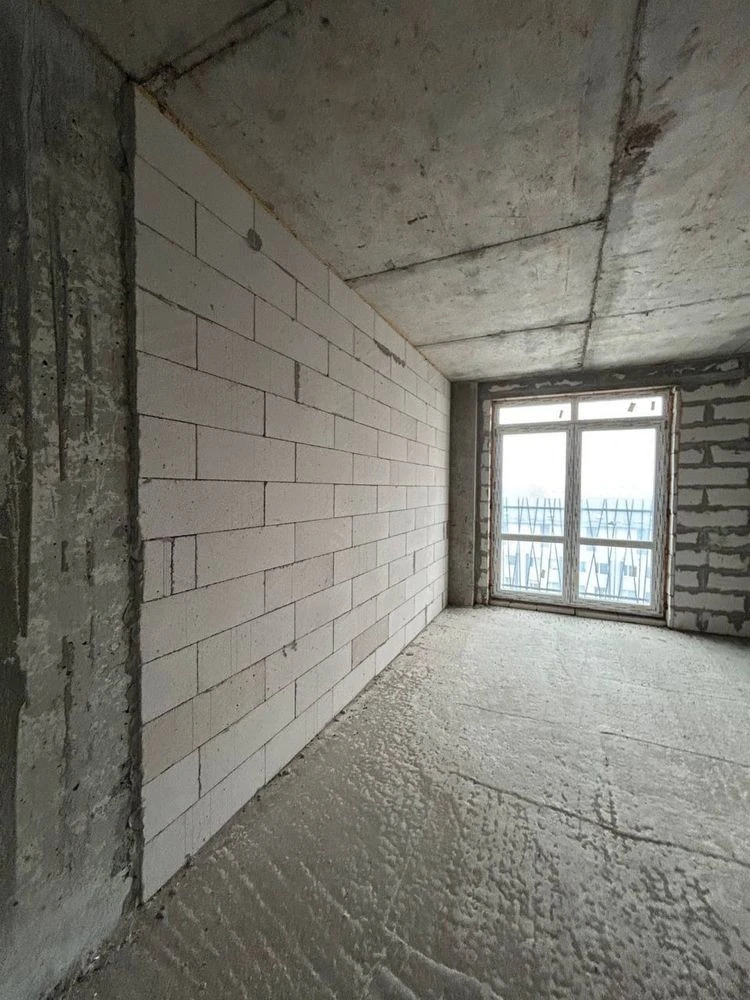 For sale, new building in the city center.