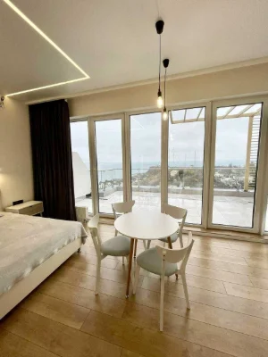 Продажа 1-комн. квартиры с террасой 16 м² и видом на море в