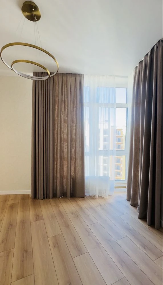 Three-room apartment in a business class residential complex