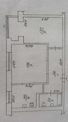 Sale of a two-bedroom apartment in a brick building, in the center.