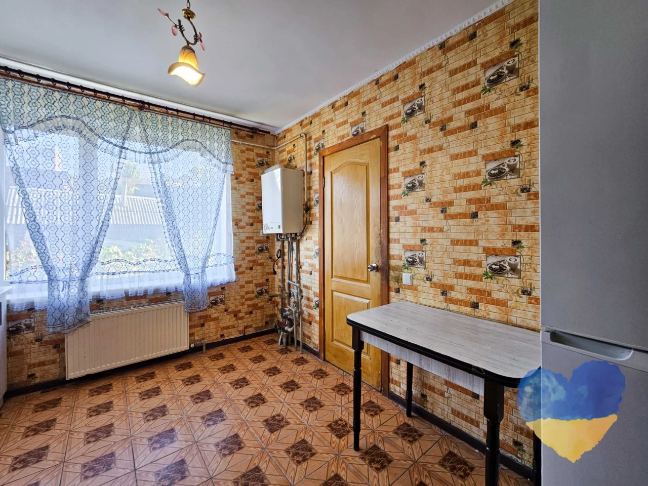Cozy 2-bedroom apartment with its own plot in the city