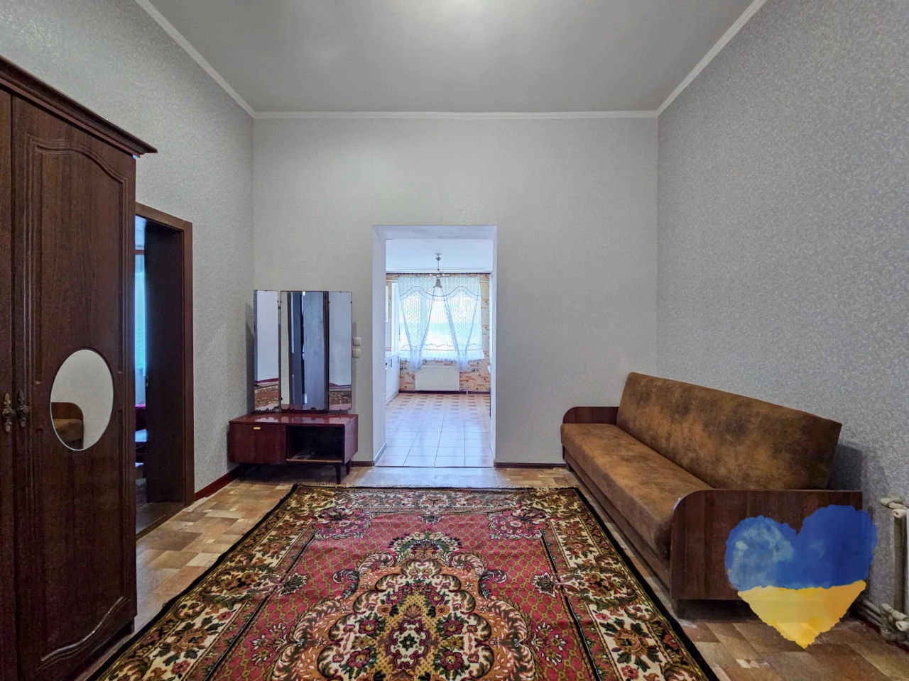 Cozy 2-bedroom apartment with its own plot in the city