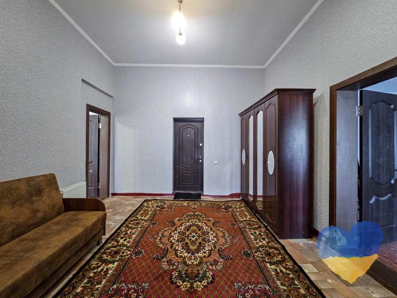 Cozy 2-bedroom apartment with its own plot in the city