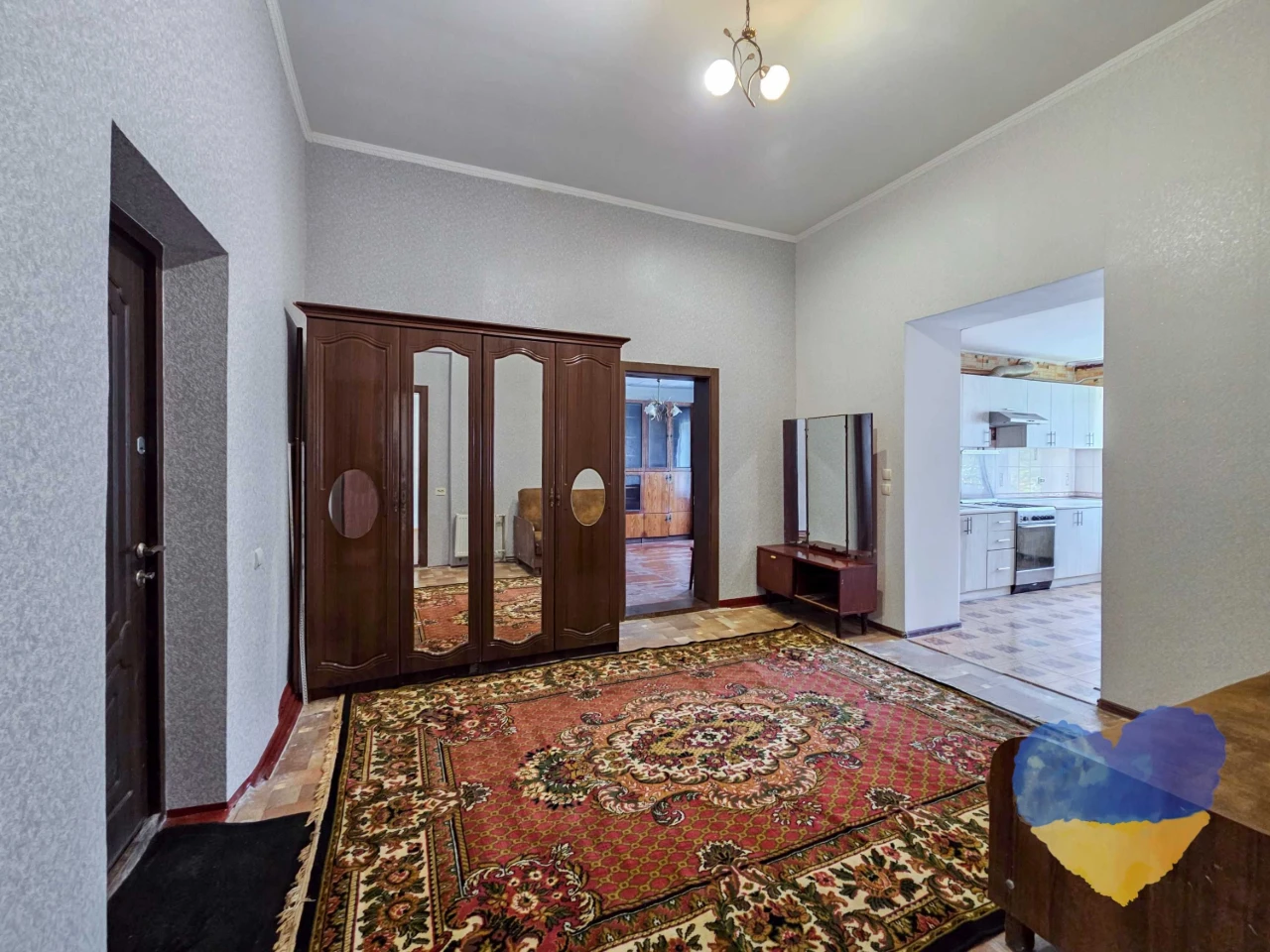 Cozy 2-bedroom apartment with its own plot in the city