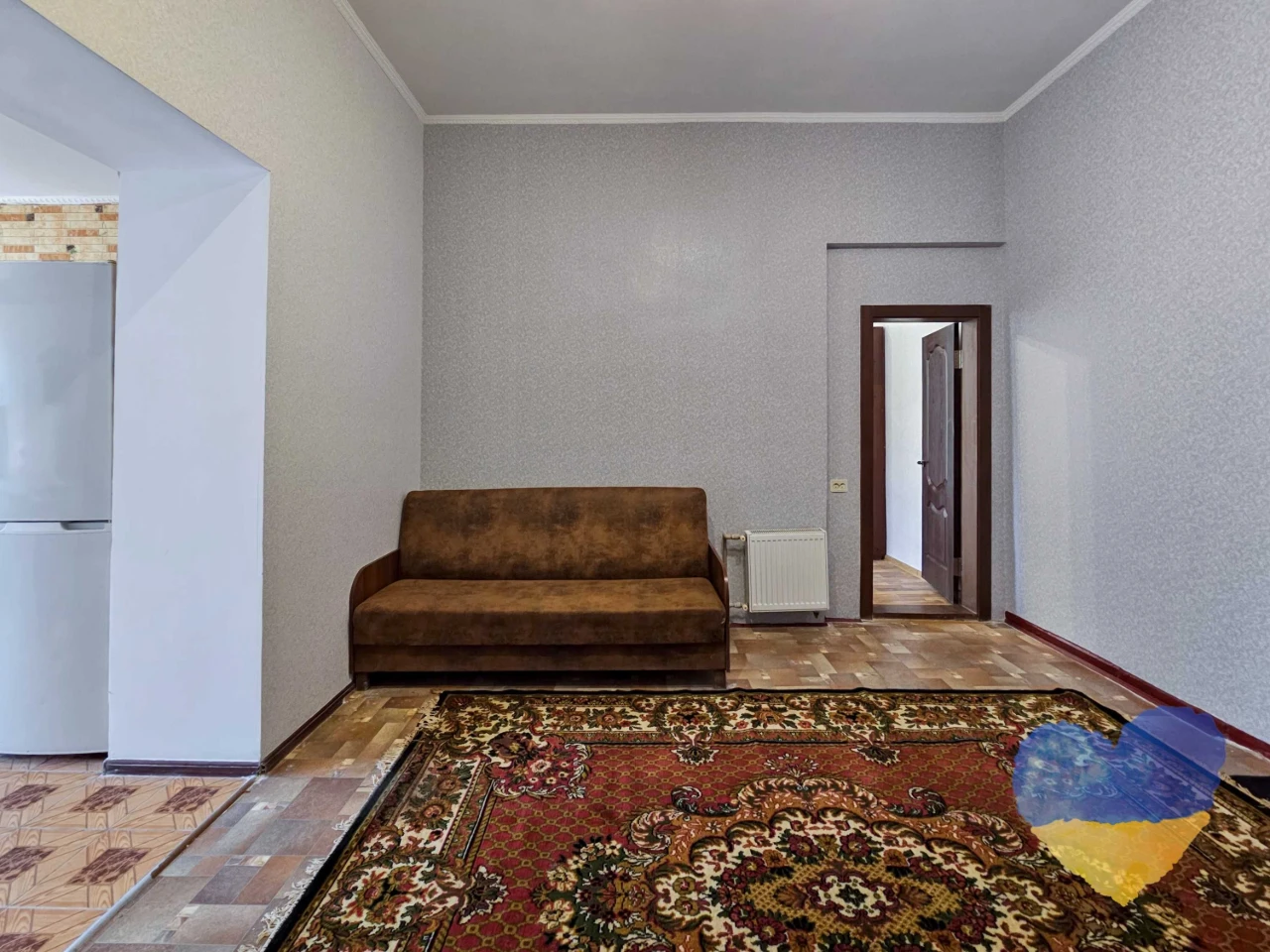 Cozy 2-bedroom apartment with its own plot in the city