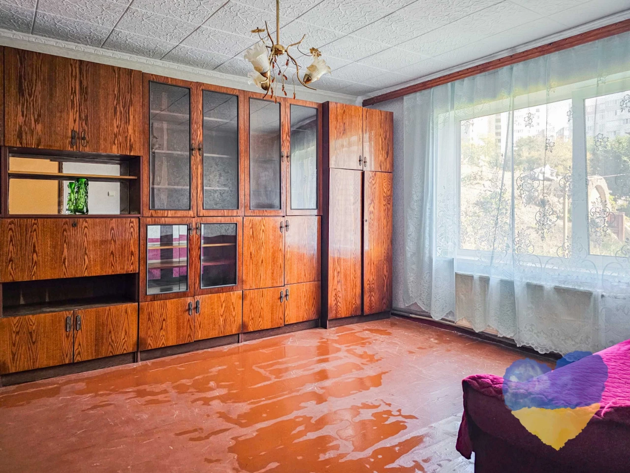 Cozy 2-bedroom apartment with its own plot in the city