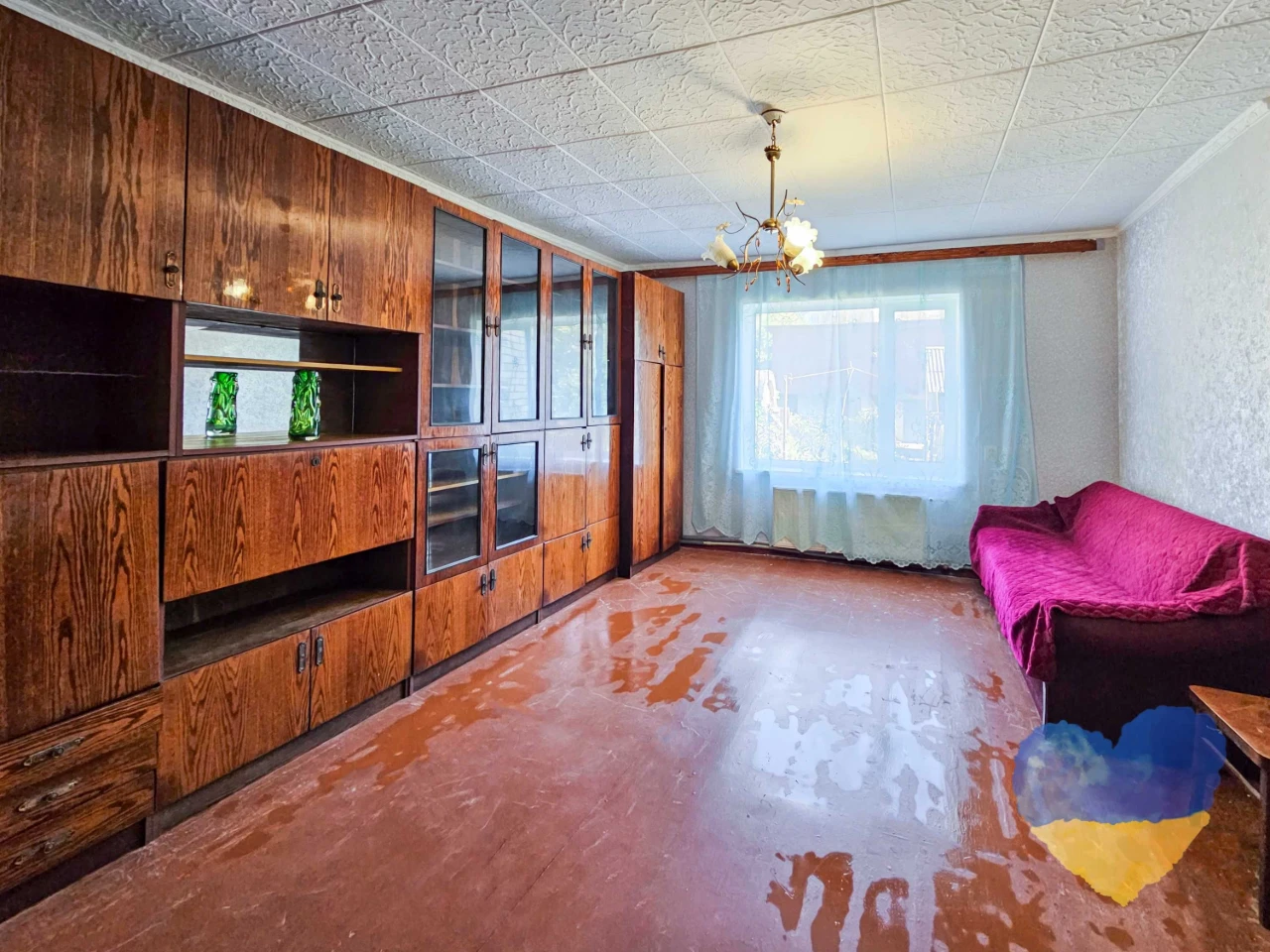 Cozy 2-bedroom apartment with its own plot in the city