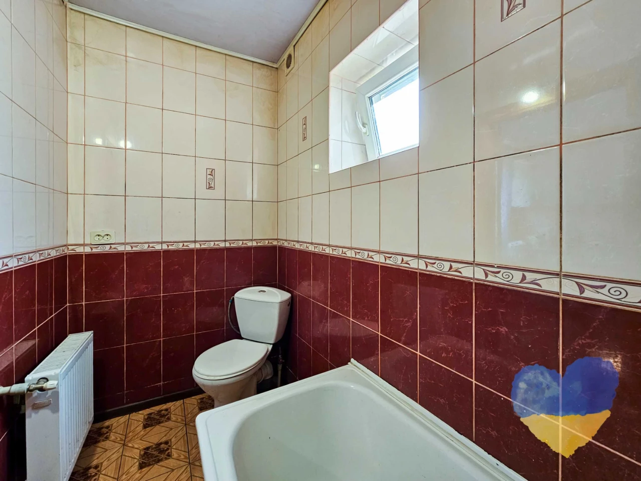 Cozy 2-bedroom apartment with its own plot in the city
