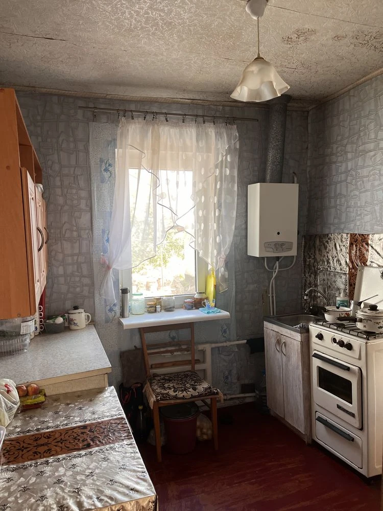 Продаж половини будинку в районі проспекту Металургів, 6