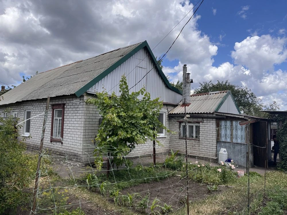 Продаж половини будинку в районі проспекту Металургів, 6