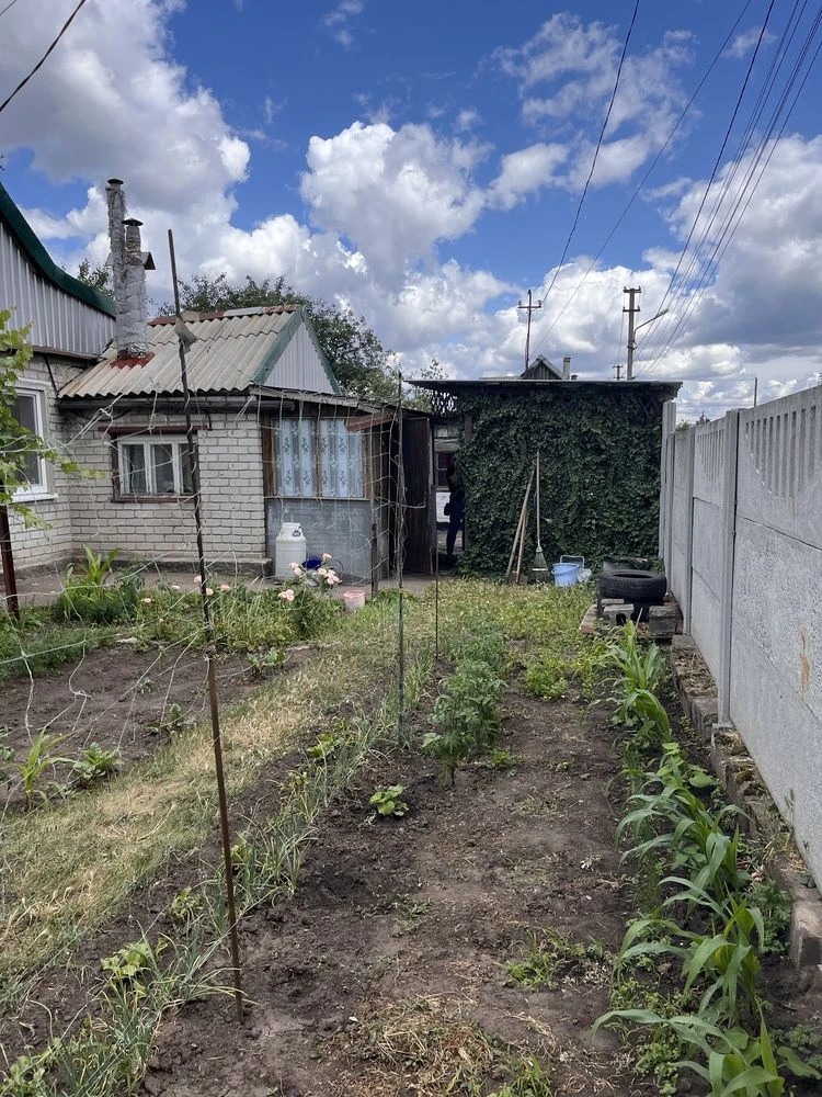 Продаж половини будинку в районі проспекту Металургів, 6