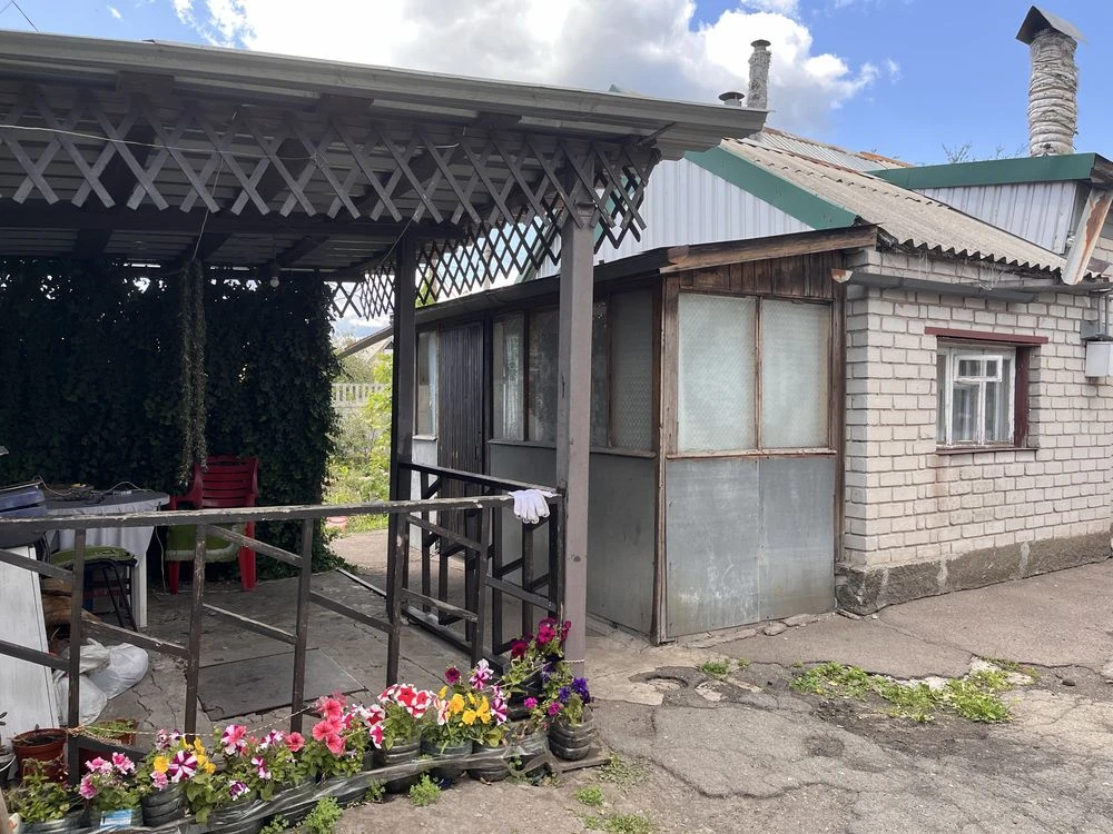 Продаж половини будинку в районі проспекту Металургів, 6