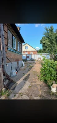 For sale: 1/2 of a house with a separate yard.