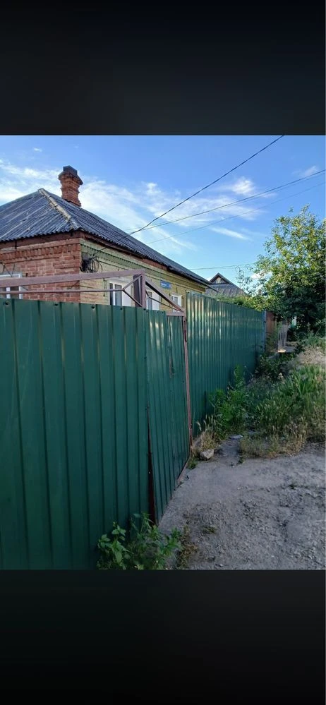 For sale: 1/2 of a house with a separate yard.