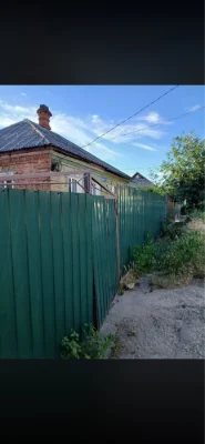 For sale: 1/2 of a house with a separate yard.