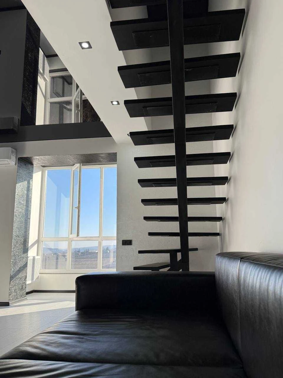 Stylish two-level penthouse for sale on Riven Street