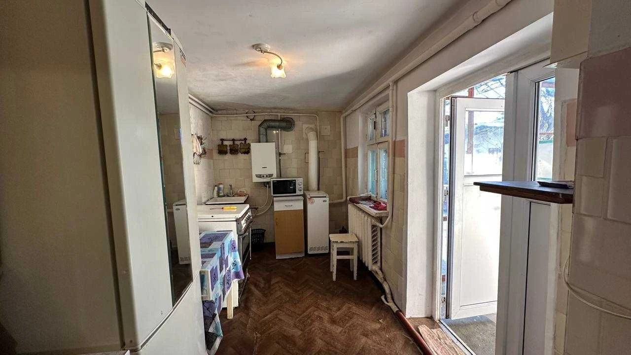 House on Slobodke — Quiet Street, 2 Garages and a Spacious Yard