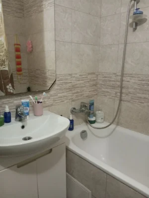Sale of a modern 1-bedroom apartment with furniture and appliances.