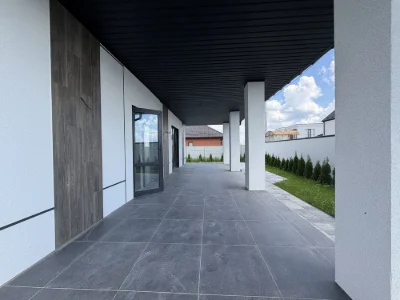 Sale of a modern one-story house with a pool and landscape