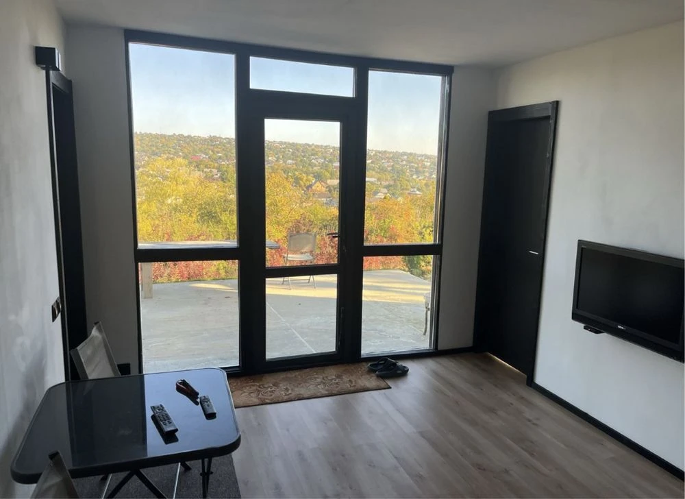 2-room apartment in a building + 9 acres of land