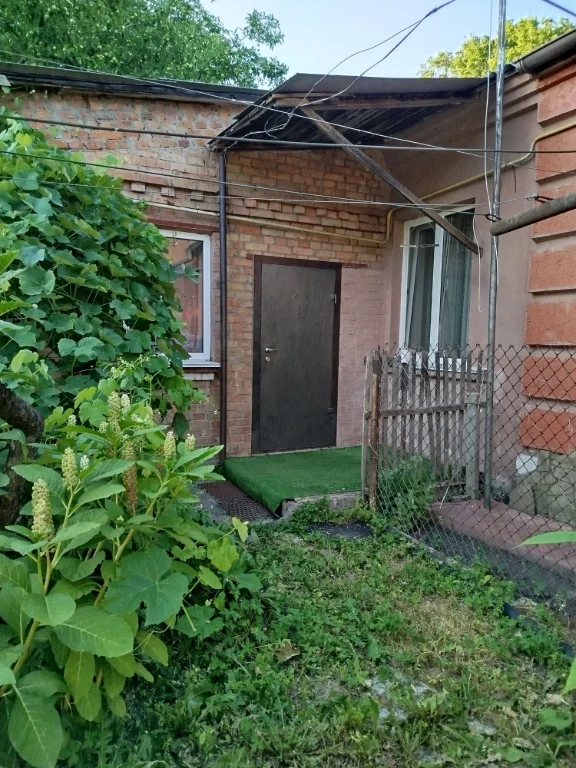 Sale of a 2-room apartment (57m²) with a separate courtyard and GARAGE!