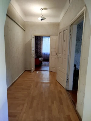 Sale of a 2-room apartment (57m²) with a separate courtyard and GARAGE!