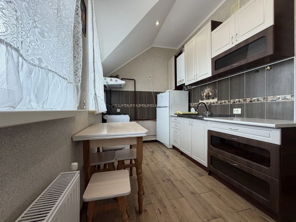 Sale of a 1-room apartment with its own heating in the center!