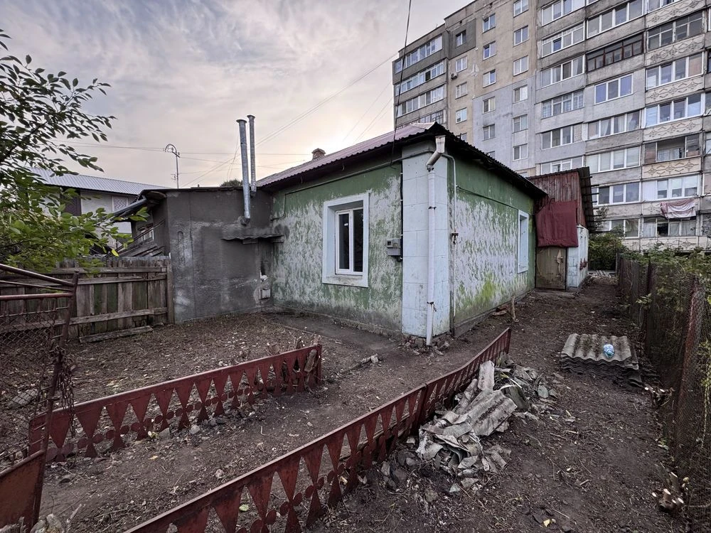 Land for sale with part of a house
