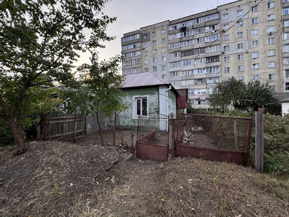 Land for sale with part of a house