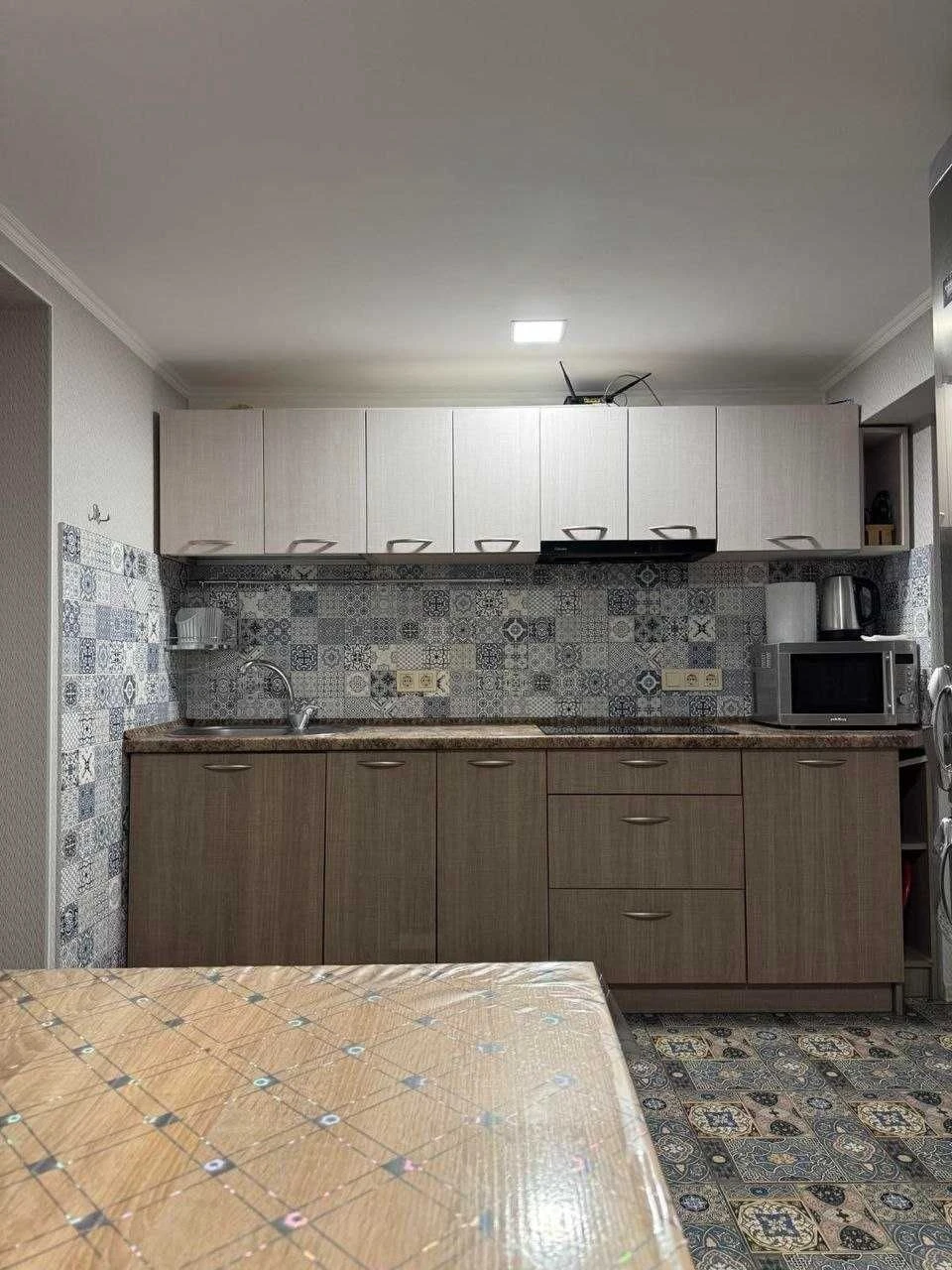 Однокімнатна квартира 40 м2. У підвалі приватного будинку