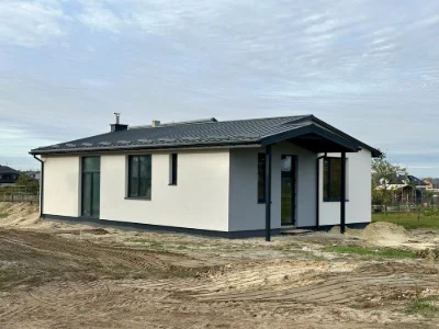 Detached brick house with convenient layout in a private plot
