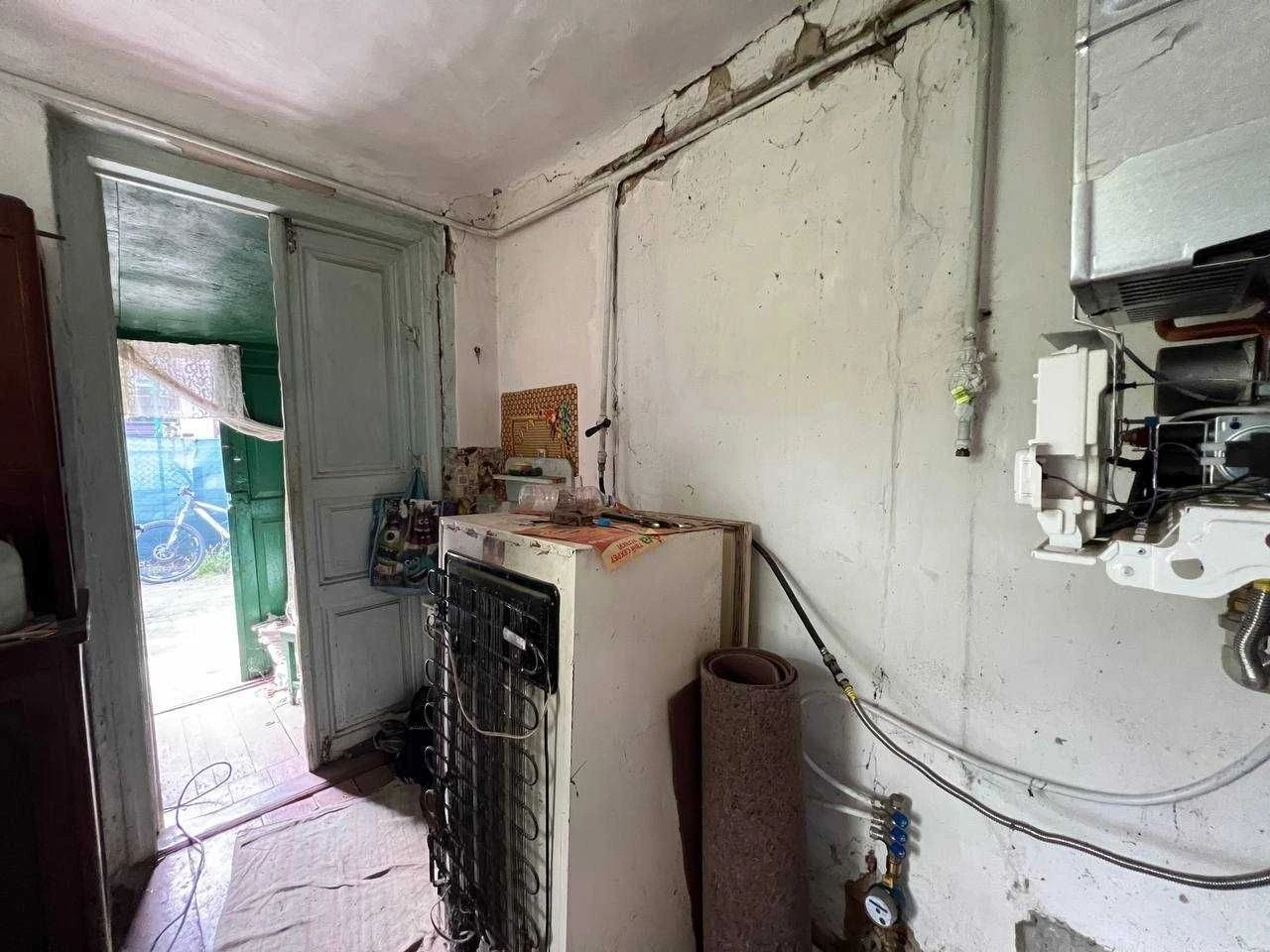 Part of a house on St. Sidorovsky. Center