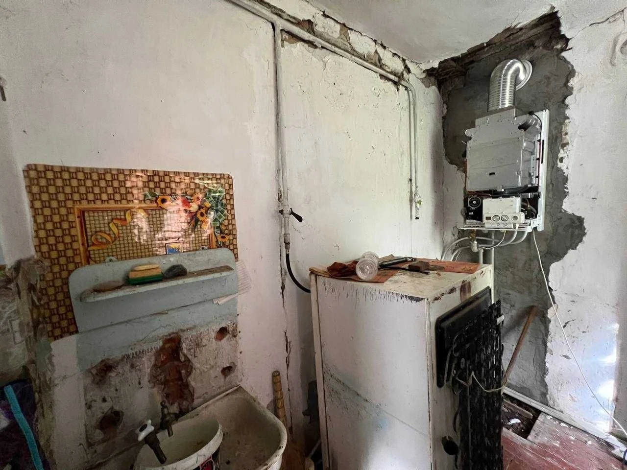 Part of a house on St. Sidorovsky. Center