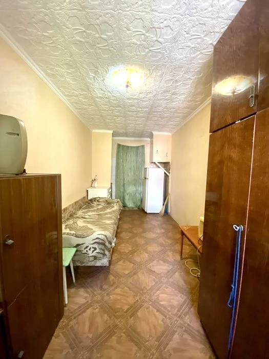 Room for sale in a communal apartment in the city center, Se