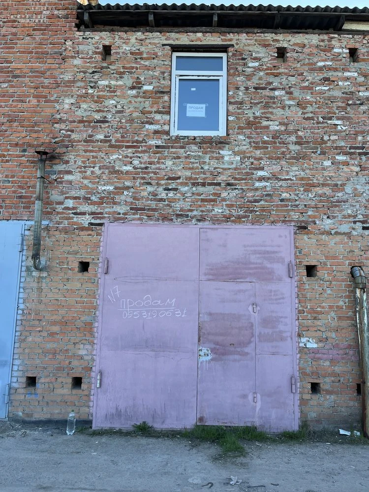 For Sale: Two-Story Garage (with Two Entrances)