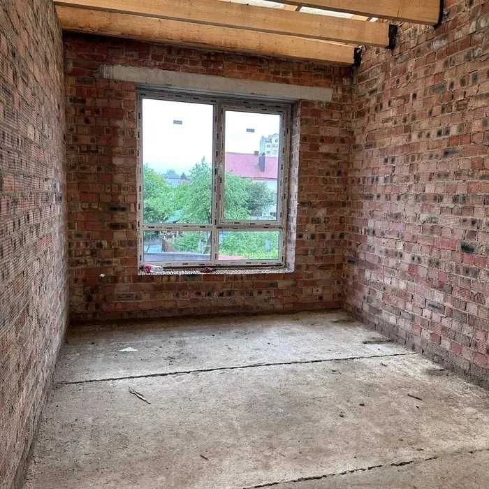 For Sale: Modern Townhouse with Private Courtyard!