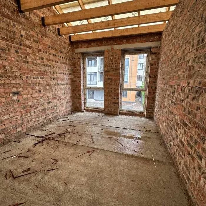 For Sale: Modern Townhouse with Private Courtyard!