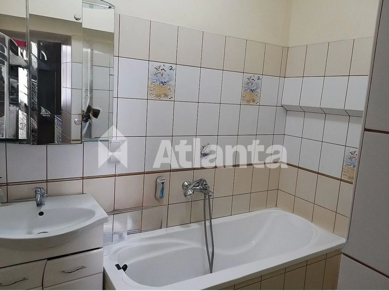 2-room apartment in the city center, state-of-the-art, parking space, attic