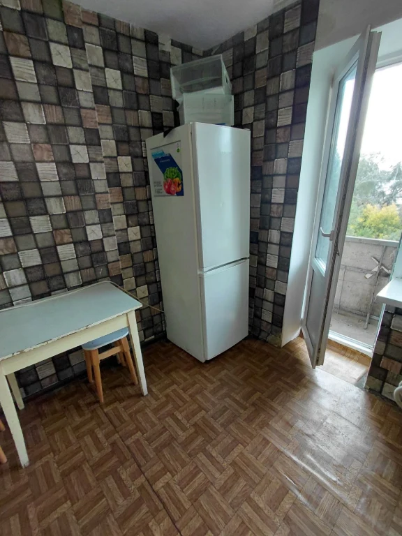 One-bedroom large apartment, brick building.
