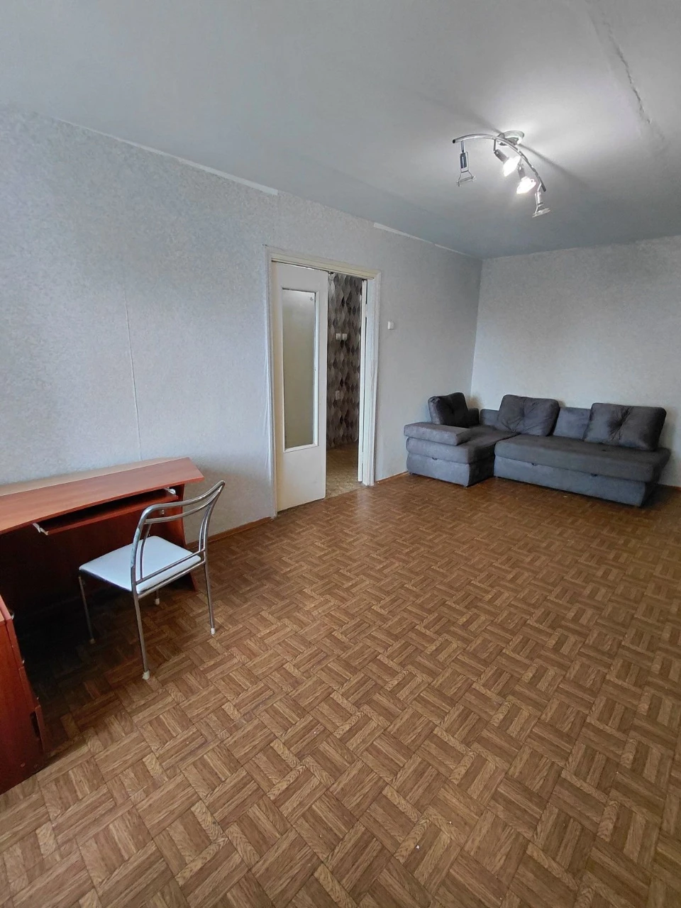 One-bedroom large apartment, brick building.