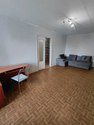 One-bedroom large apartment, brick building.