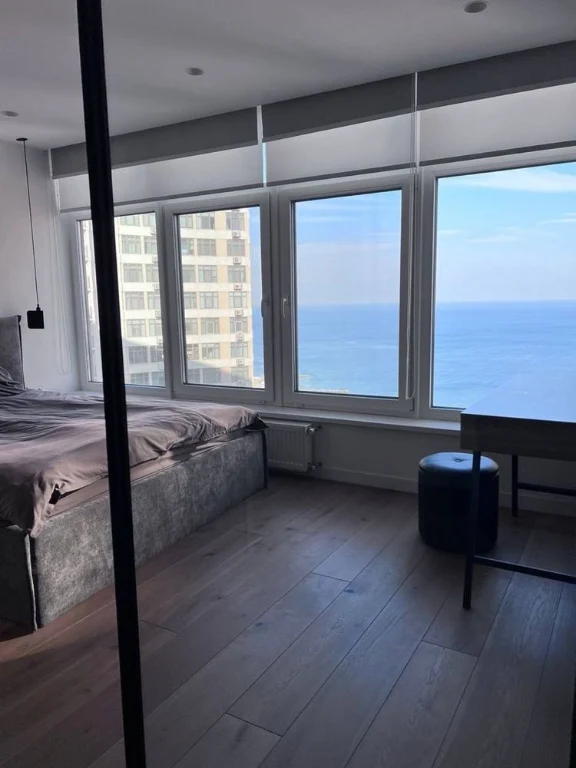 For sale a large one-bedroom apartment with a direct sea view