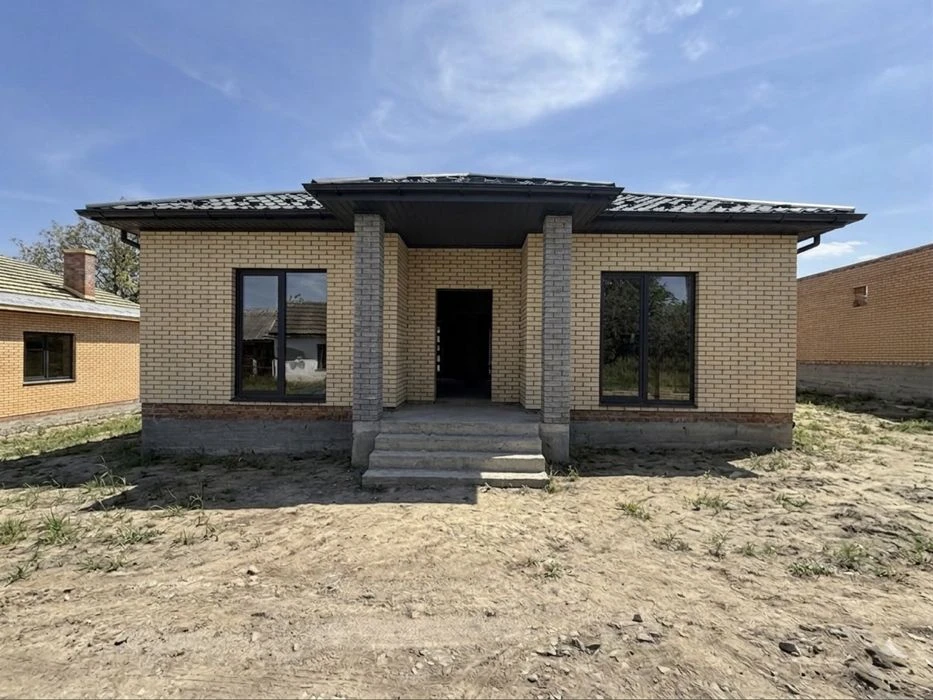 Продажа дома в городе с центральными коммуникациями
