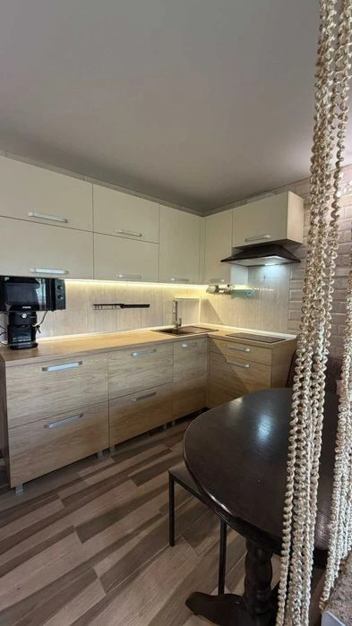 For sale: stylish 2-room apartment in a new building near the metro station.