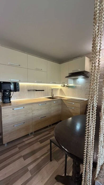 For sale: stylish 2-room apartment in a new building near the metro station.