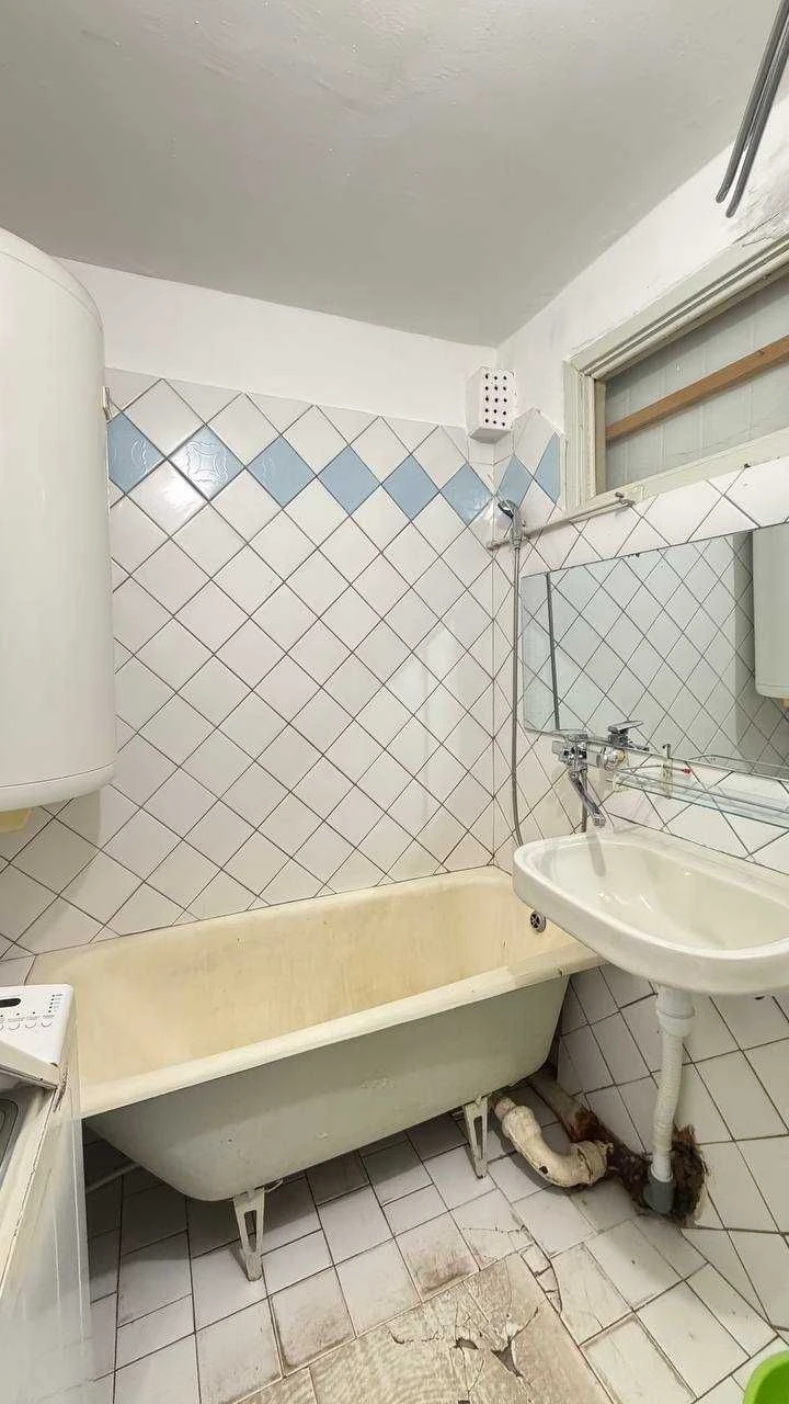 Продажа трехкомнатной квартиры в центре