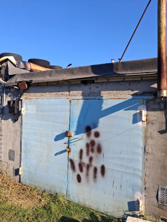 For Sale: Garage with Wood-burning Stove