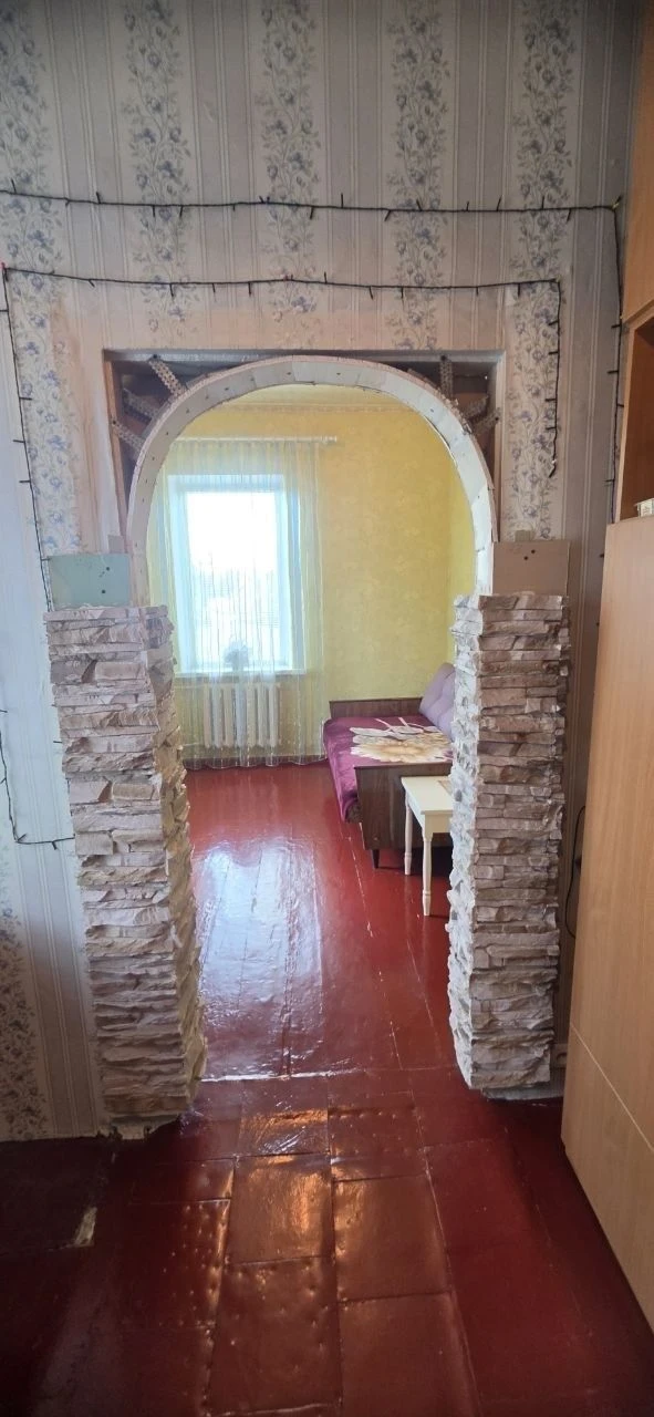 Продам 1/2 дома со своим отдельным входом(ул.Киевская)