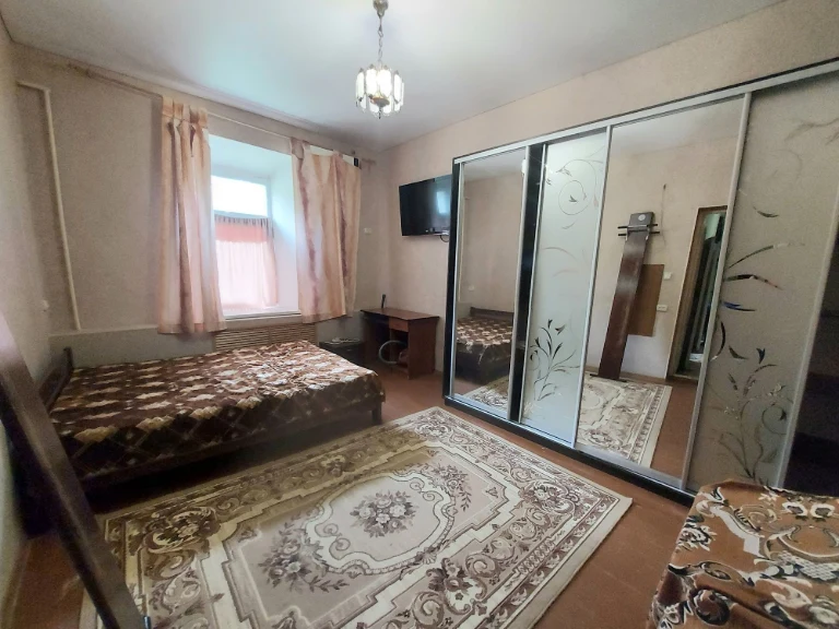 2-room apartment on the first floor of a stone building