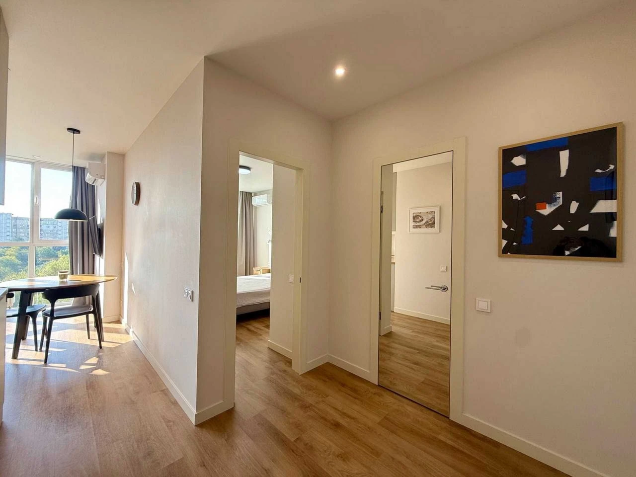 Modern 1-bedroom apartment with separate bedroom and kitchen-living room